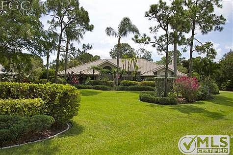 View of the front of the residence. Oversize corner lot, close to the Fiddlesticks clubhouse.