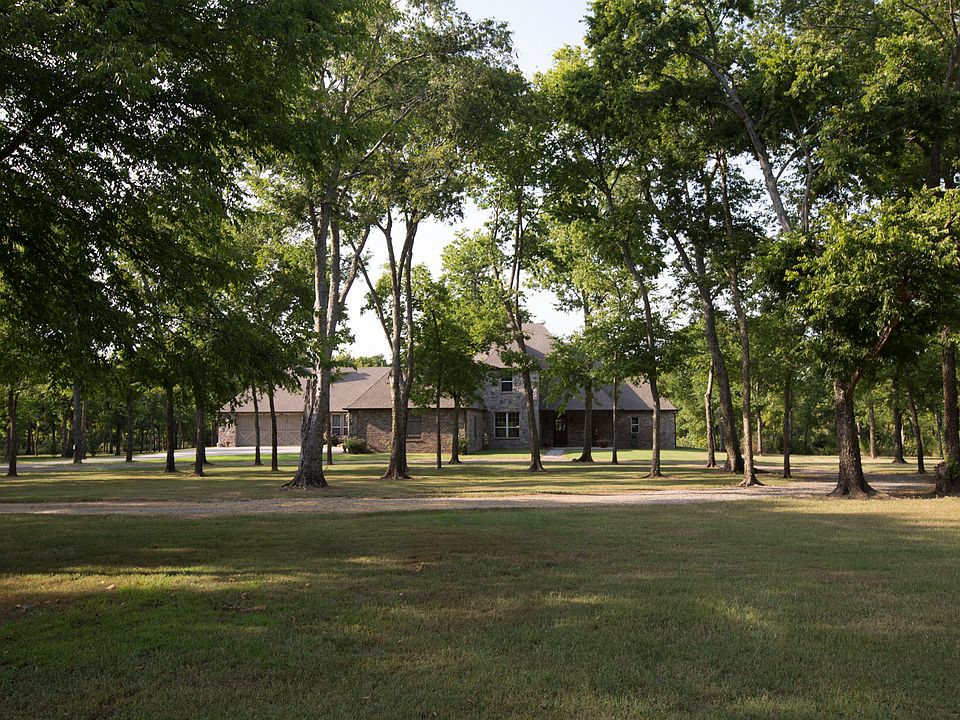 Many mature trees in front entrance