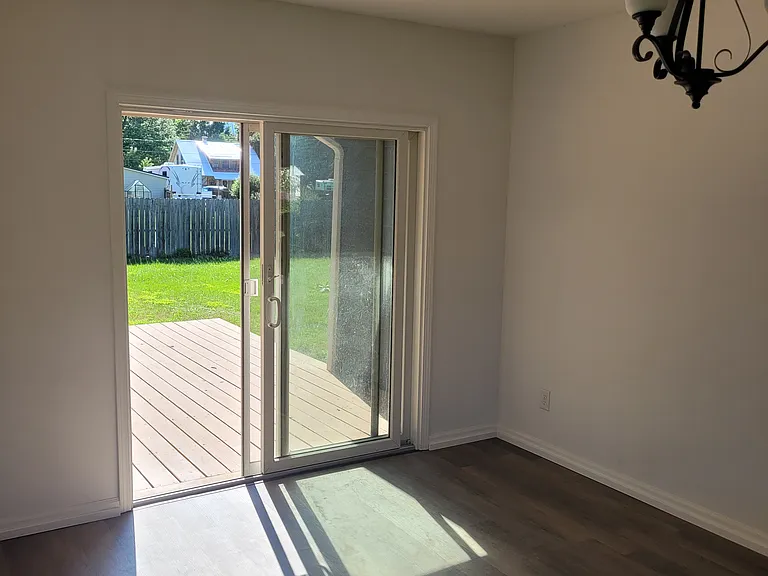 Dining room with sliding door out to the large patio.