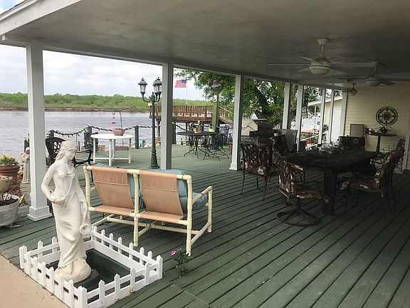 Covered deck overlooks water