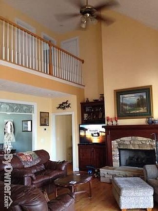 Living room
						:
						Beautiful stacked stone fireplace
