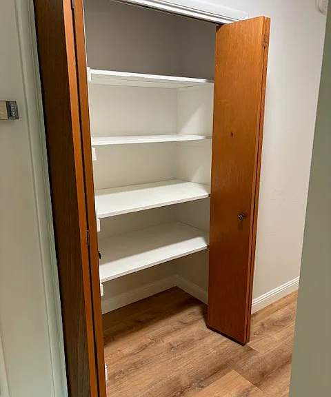 Closet for storage off hallway.