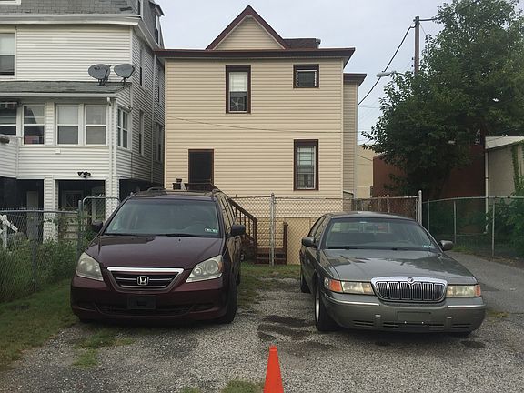 view of off street parking 