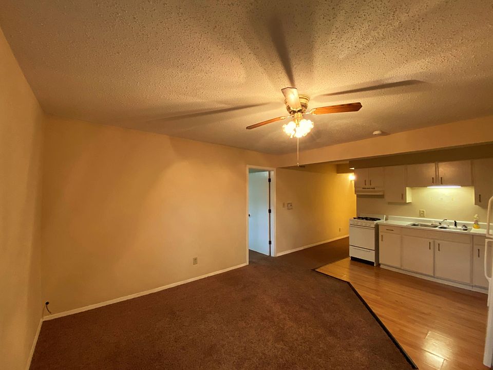 Spacious, bright living room with lovely floors and heaps of streaming natural light!