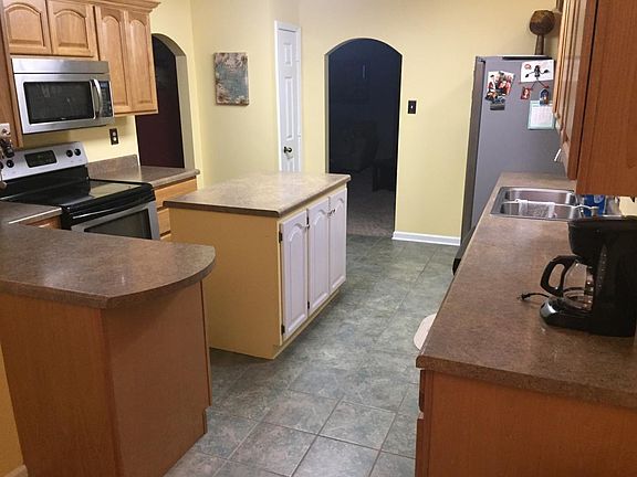 Kitchen and Eat in Area and laundry