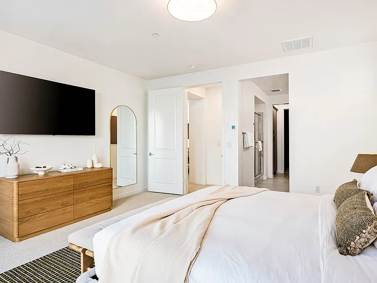 Your primary suite _ bright, spacious, and totally your own retreat.