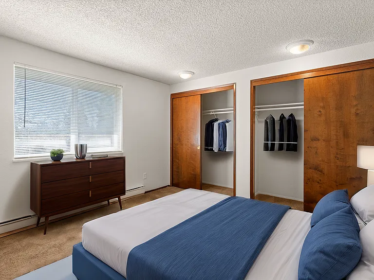 Experience restful nights in this stylishly designed bedroom with ample storage and natural light. Experience restful nights in this stylishly designed bedroom with ample storage and natural light.