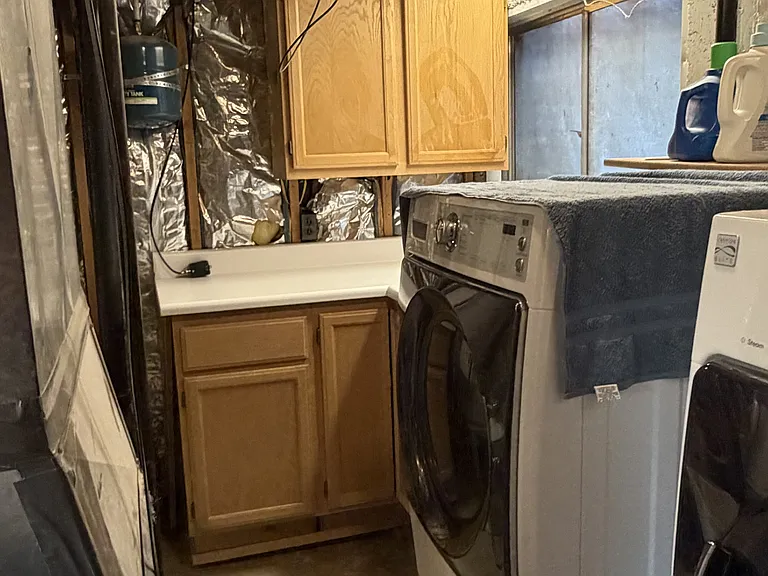 Laundry area, down