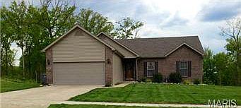Gorgeous walkout ranch, beautifully kept yard backing to wooded