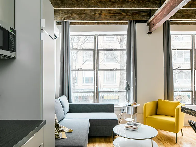 Open floor plan and feature windows maximize and extend space