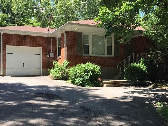 Attached one car garage plus extra parking