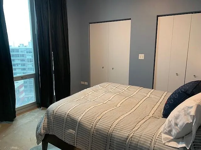 Twin built-in closets. New bed/matress and new bed and bath linens for each new tenant. Side table, twin closets and armoire. Alexa ready.