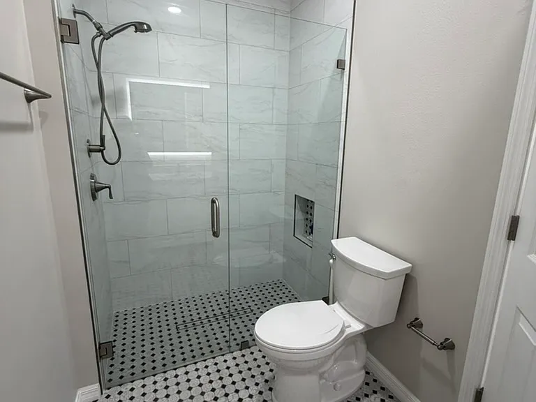 Walk-in shower and upgraded tile