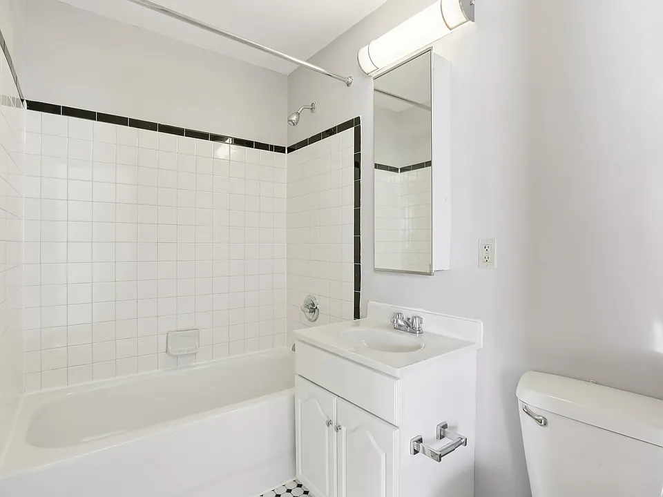 Unit 311 bathroom photographed February 2026. Features vary by apartment.