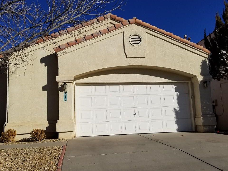 Front of house- this house sits on an extra big lot and is nested between two story house homes. The neighborhood is very quiet and safe.