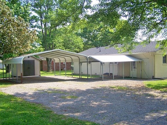 Two carports in back