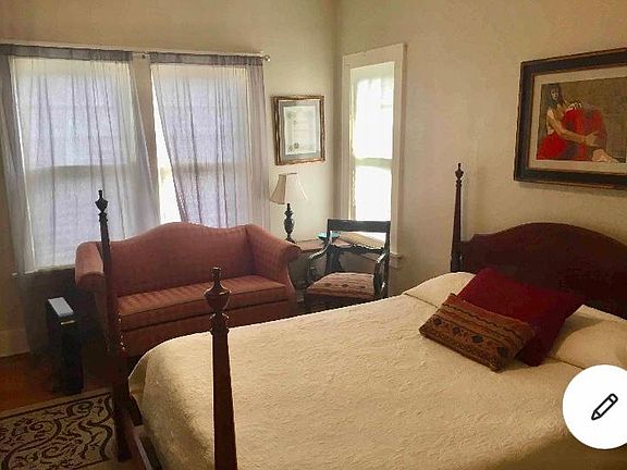 Second bedroom with beautiful antique bed with queen foam mattress