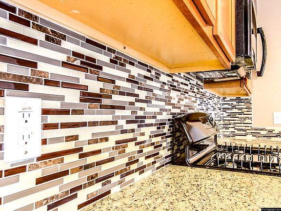 Beautiful mosaic tile backsplash.