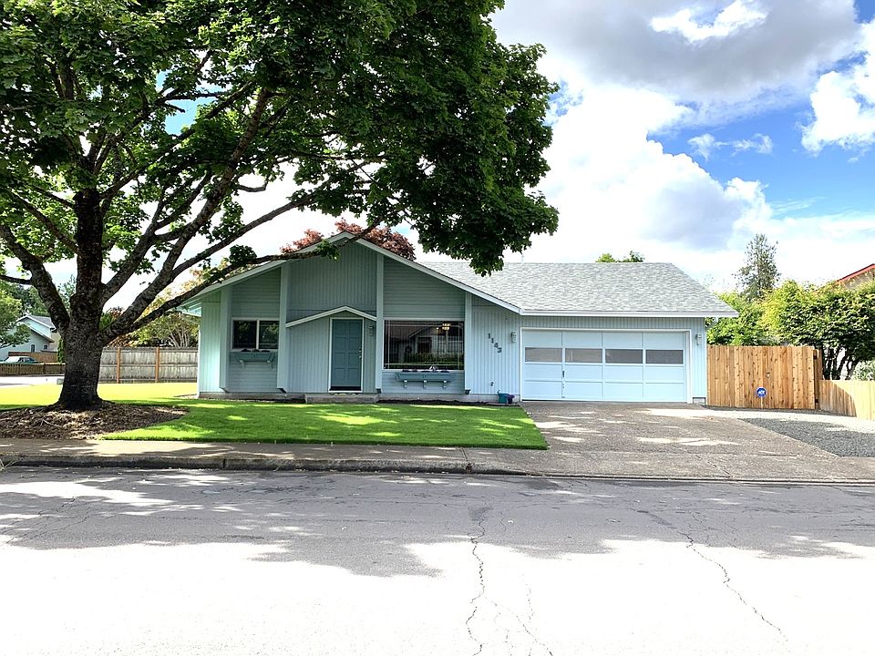 Great 3-bed, 2-bath home on corner lot with small RV parking area.