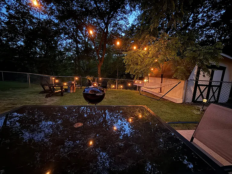 Fenced backyard with firepit, hammock, outdoor dinning, bbq, and direct forest access _ rare for a rental at any price