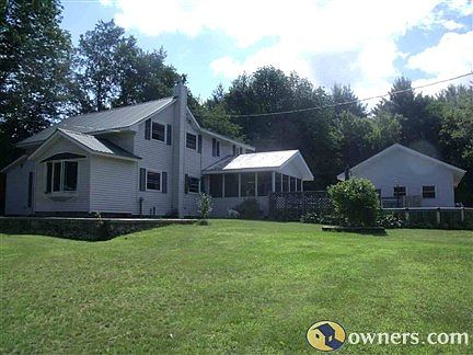 Side view of property,house,pool & garage