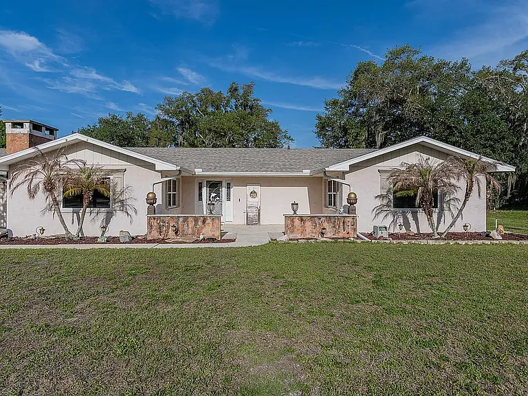 5905 Whispering Pines Rd — Photo 1