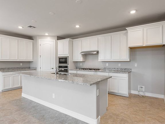 10113 E Wavelength Avenue - Jimson Floorplan - White Kitchen