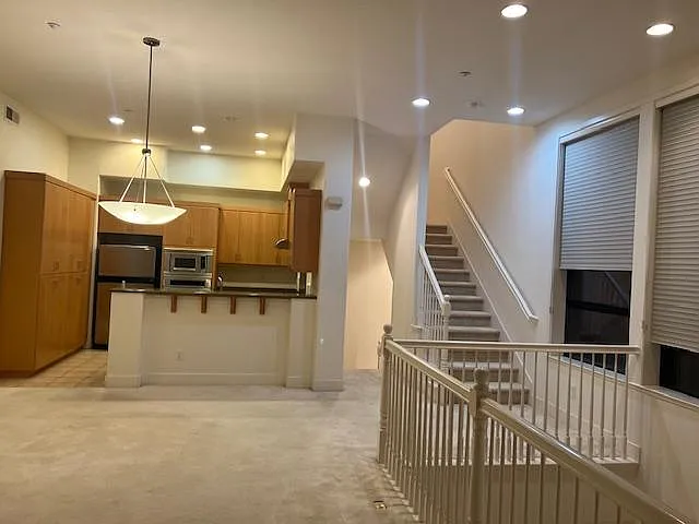 Main Floor - Great Room, Den, Kitchen, Hall Bath, Laundary Room, Big Tall Windows, 2 Balconies...