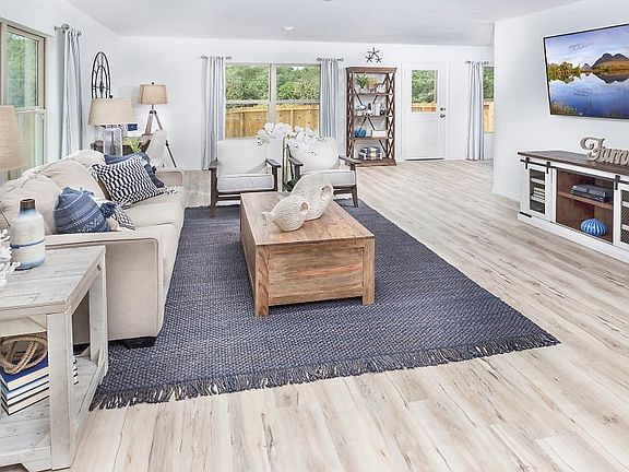 As the heart of this home, the spacious family room offers an ideal space for relaxing with loved on