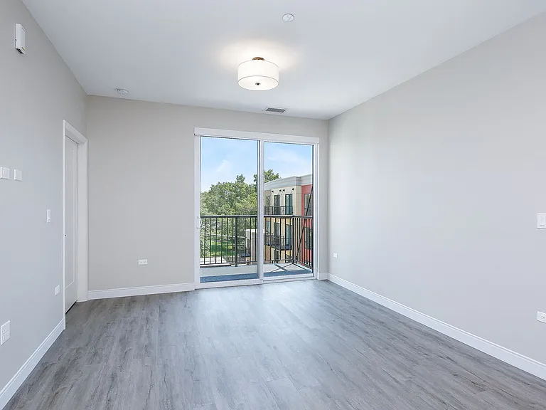 Spacious living room that features luxury vinyl plank flooring