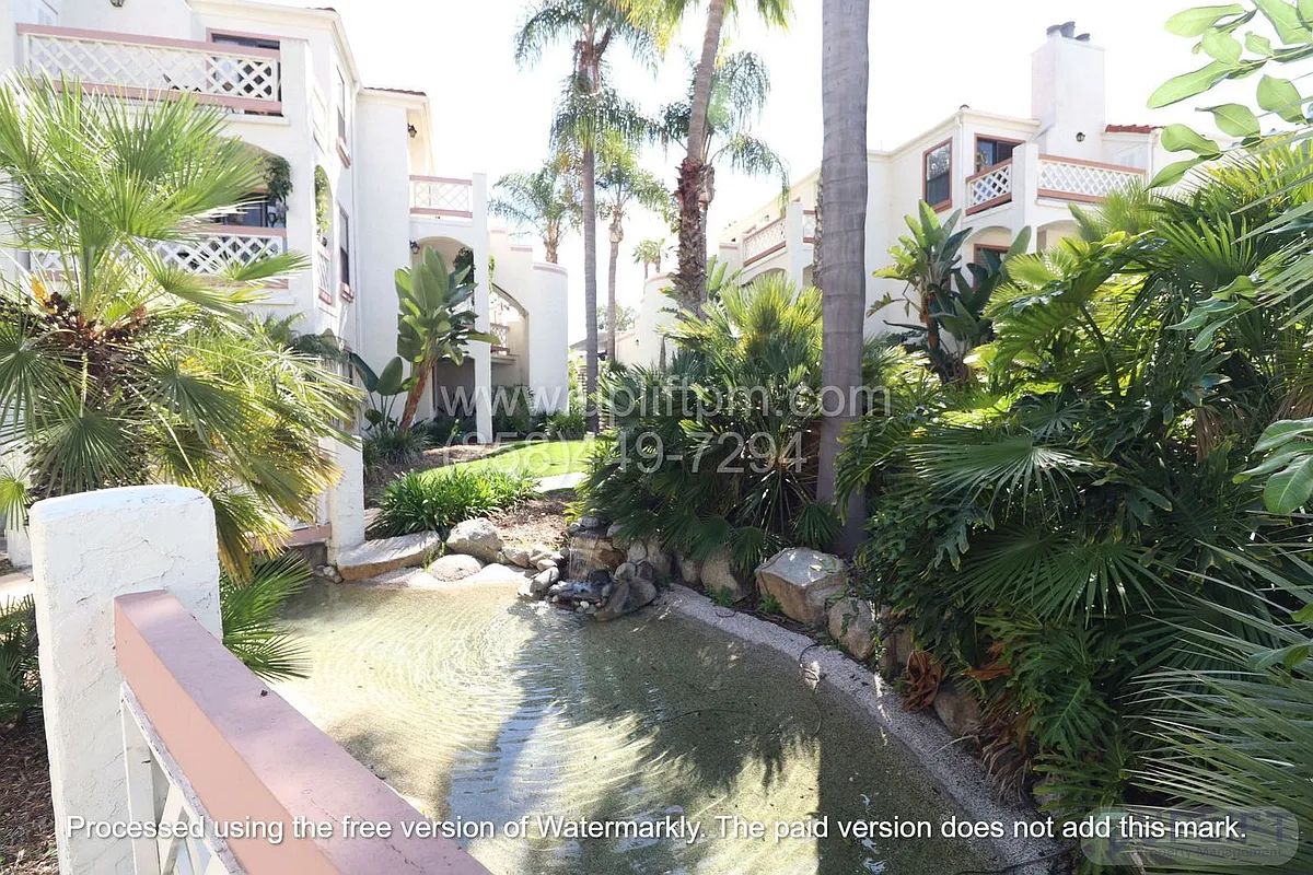 Building Photo - 9356 Twin Trails Dr #103
