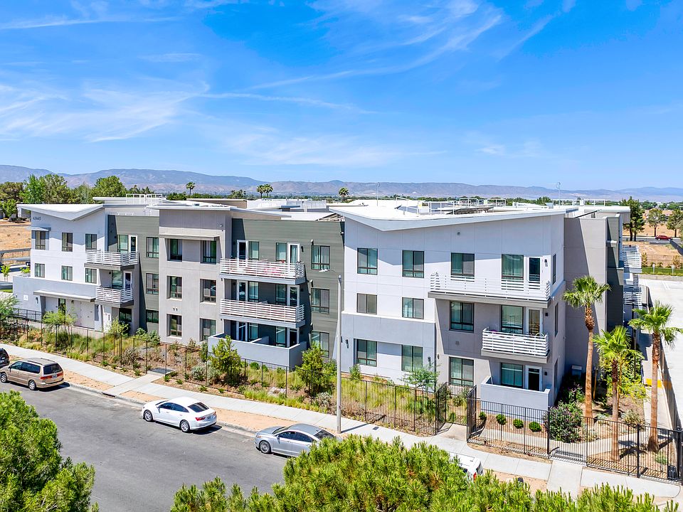 Brand-new apartment community with scenic views in a quiet residential neighborhood.