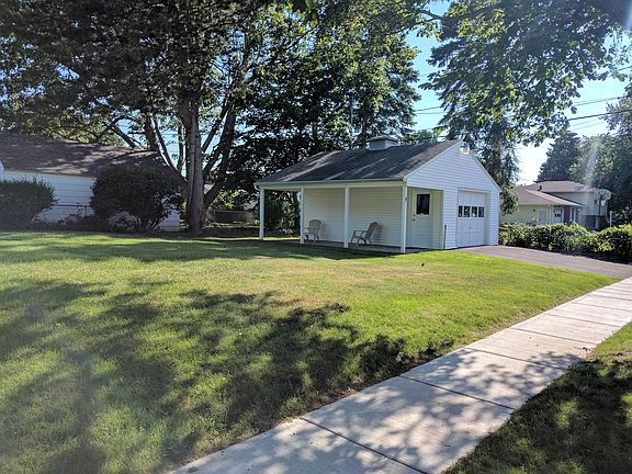 Back yard and 1.5 car garage