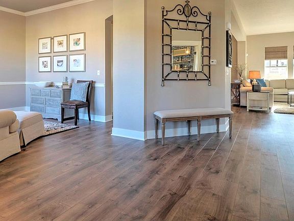 The large foyer immediately welcomes you into this open and spacious floorplan.