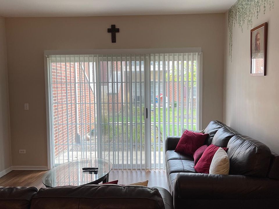 sliding door in living room leads to patio outside