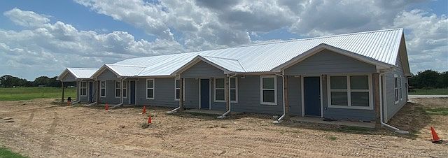 I did say "Brand New" final grading and landscaping will be completed soon.