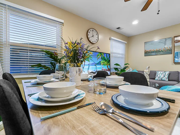 Enjoy meals and create memories at a welcoming dining table.