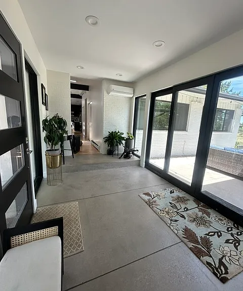 Front atrium with slider to side patio
