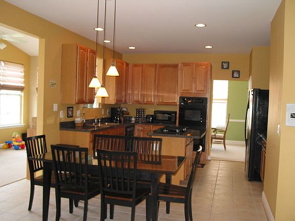 Kitchen with Upgraded Maple Cabinetry and Double Ove