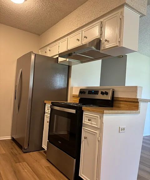 Kitchen and opening to Living area.