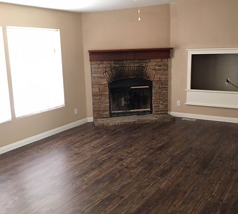 Wood burning fireplace den