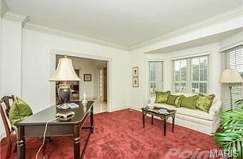 Located between the entry hall and first floor master suite