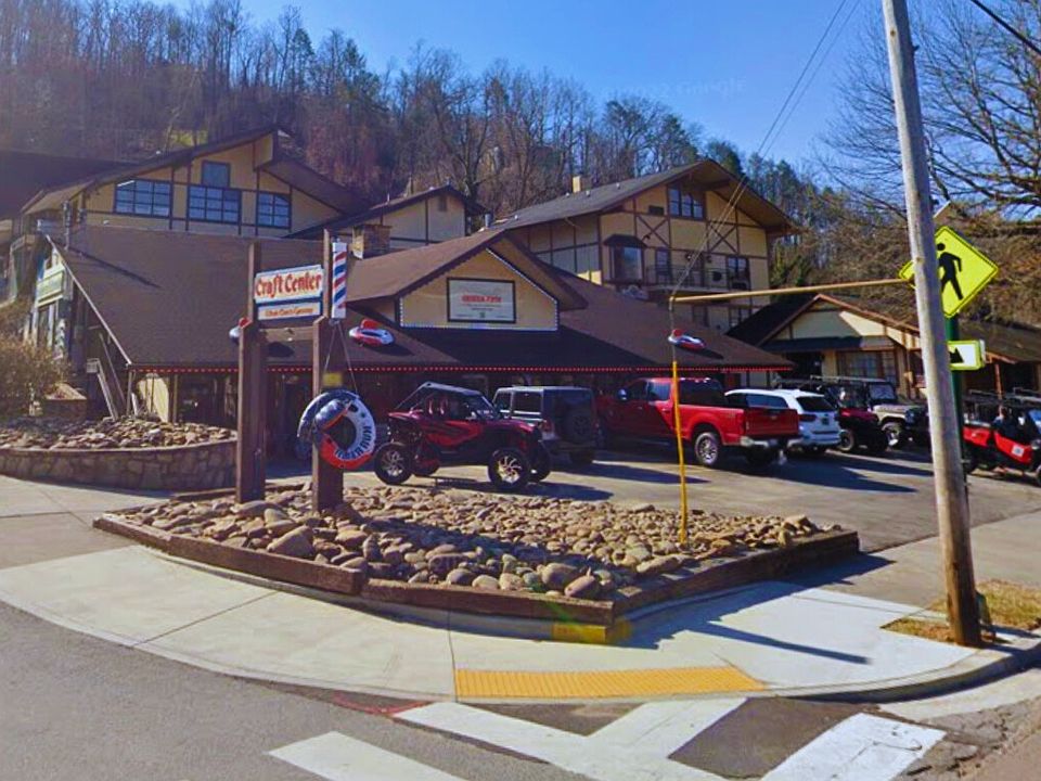 Front view of 446 E Parkway. High-traffic corridor with 10k to 20k+ Avg Annual Daily Traffic based on TDOT traffic near US 321/TN-73. Busy year-round, with peak traffic driven by tourism and proximity to GSMNP entrance.