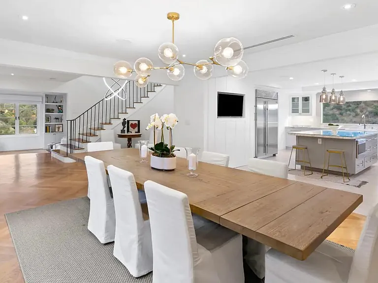 This beautiful open layout for this kitchen and dining area is perfect for family enjoyment.