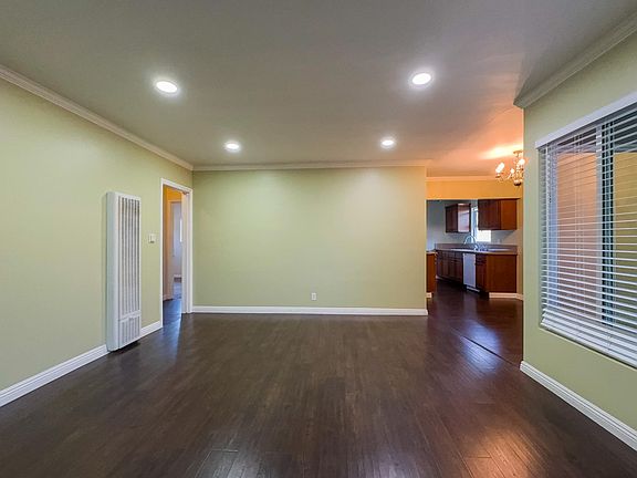 Ample Living room with new recessed lighting.