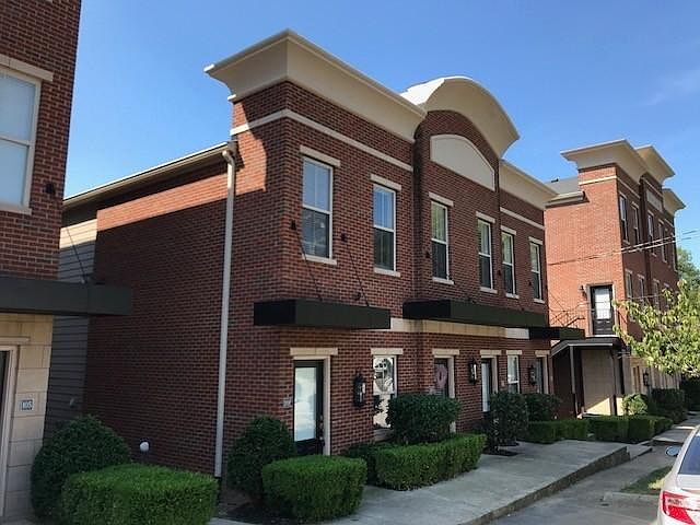 Front of the Building with plenty of greenery, nicely taken care of by the HOA
