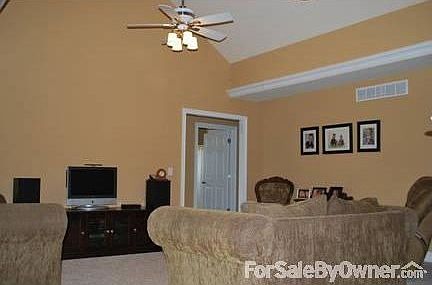 living room
						:
						vaulted ceiling, 2 ceiling fans, inset lighting, opens to back patio