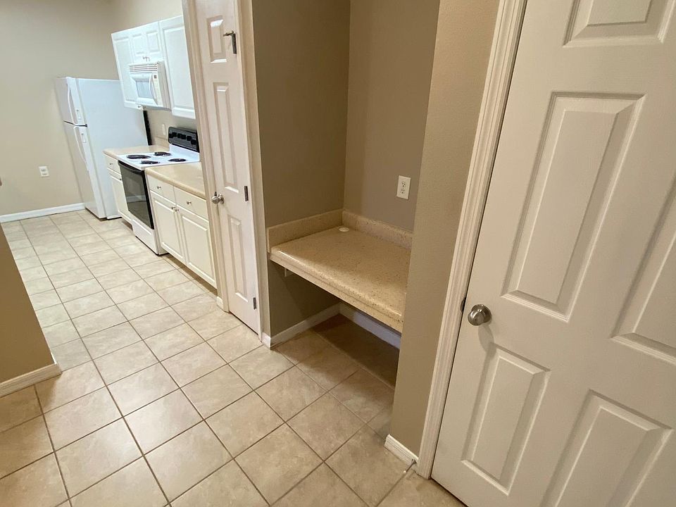 Entry with Built-In Desk, Pantry & Utility Storage Closet