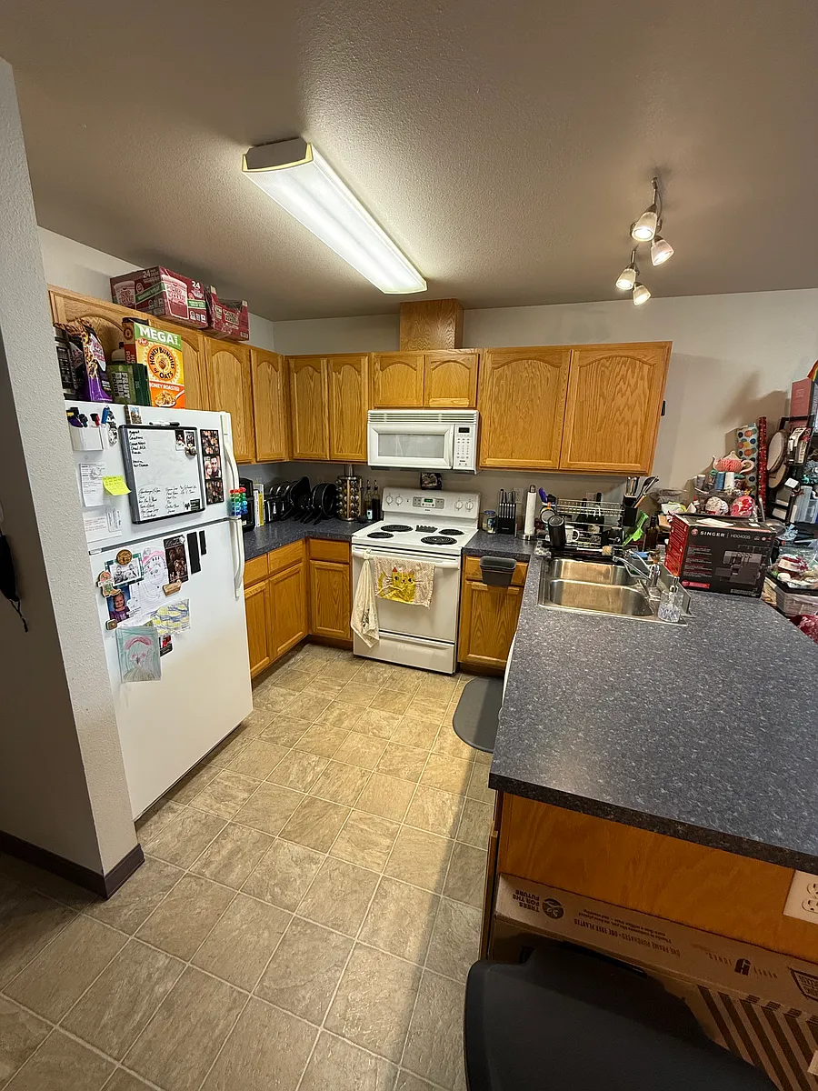 Building Photo - 1450 SE Harvest Dr #A-11