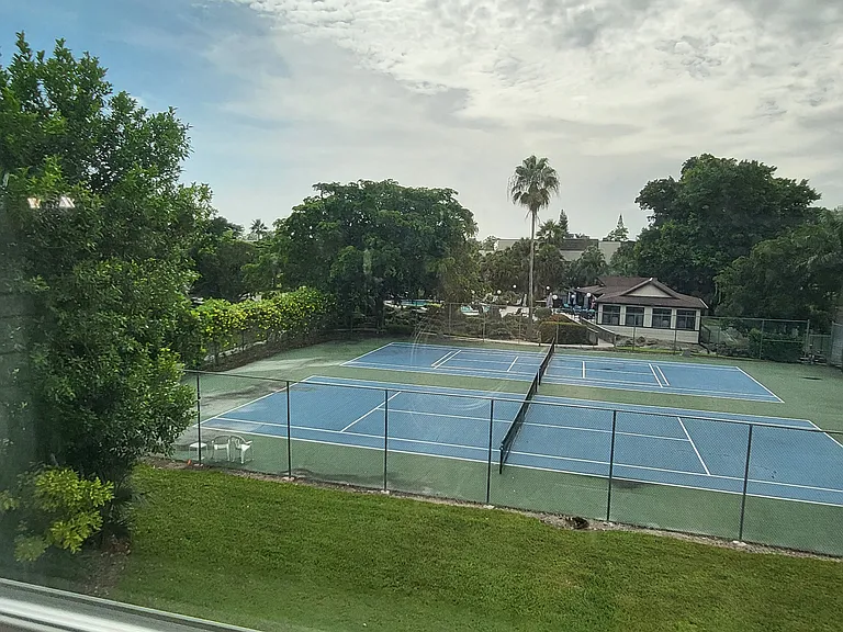 View from the M/B window of pickleball courts and community pool